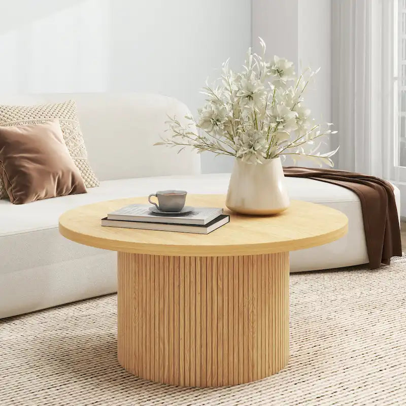 Table basse ronde en bois avec piètement cannelé